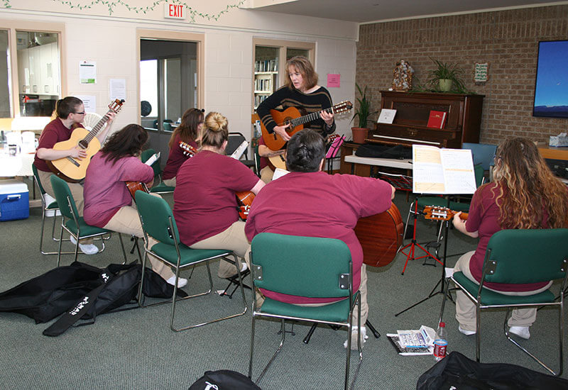 Guitar classes at the Montana Women's Prison